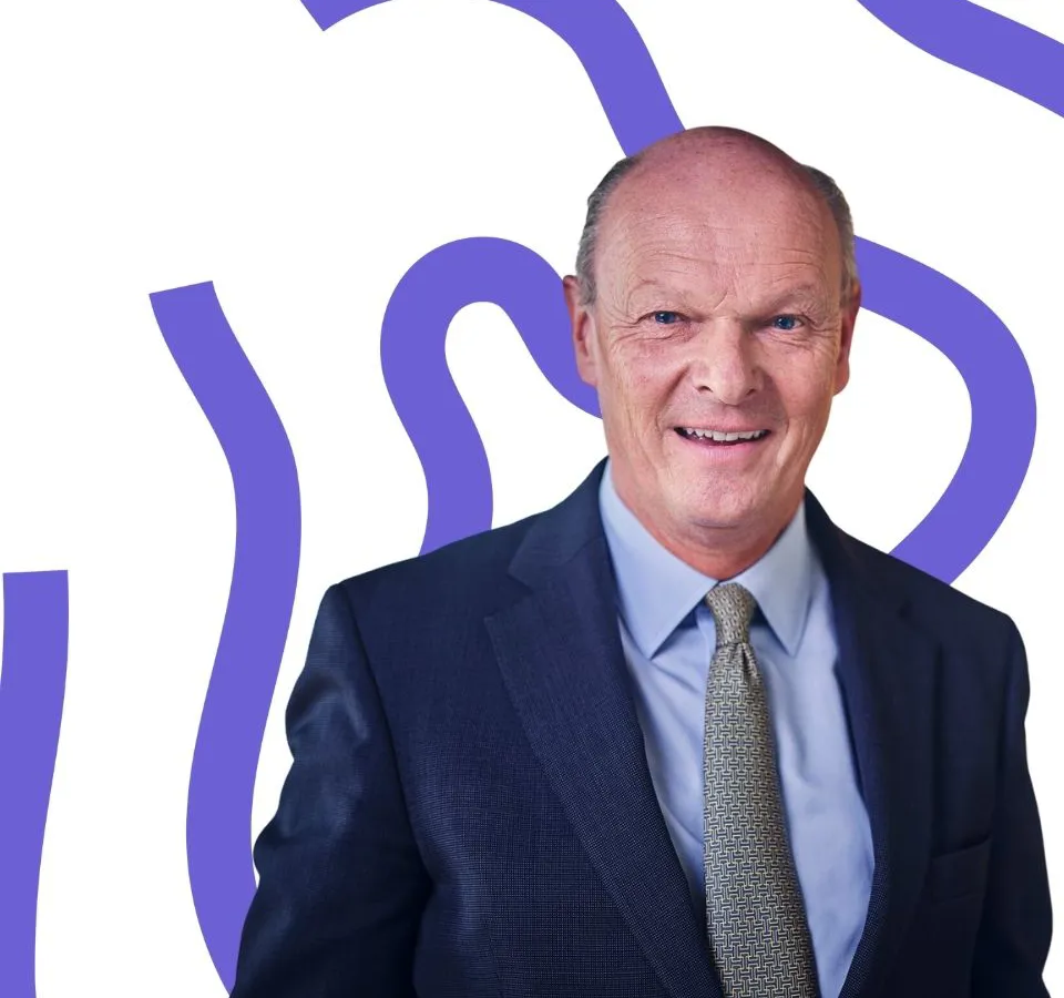 man in suit smiling